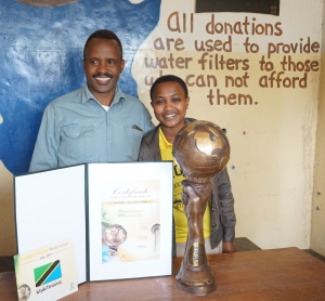 Proud of his Globe Award, Mesiaki is passing the skills to his daughter. 